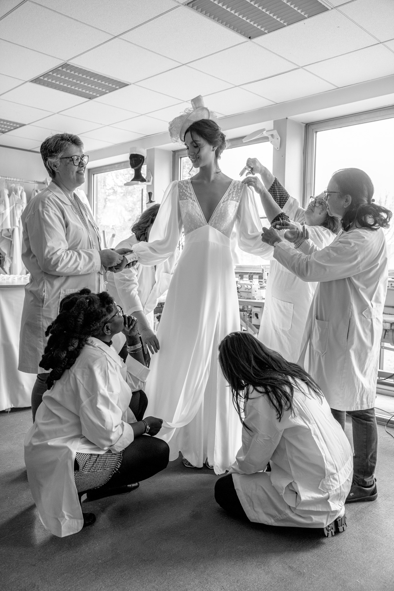 femmes dans un atelier de couture Cymbeline