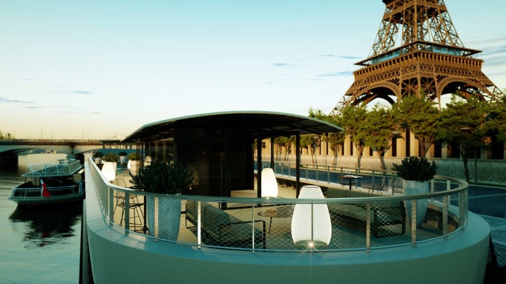 péniche naviguant sur la seine devant la Tour Eiffel
