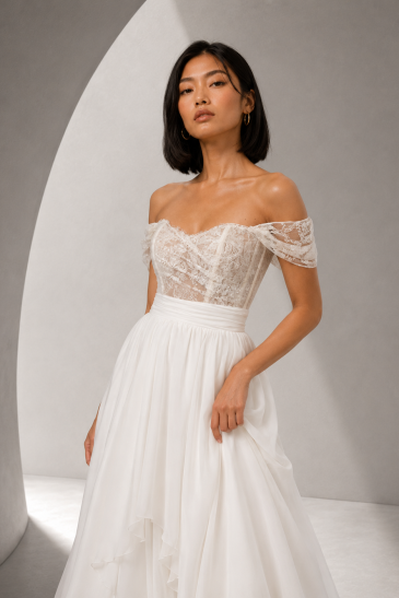 femme dans une robe de mariée A-line bohème en dentelle de Calais- Caudry