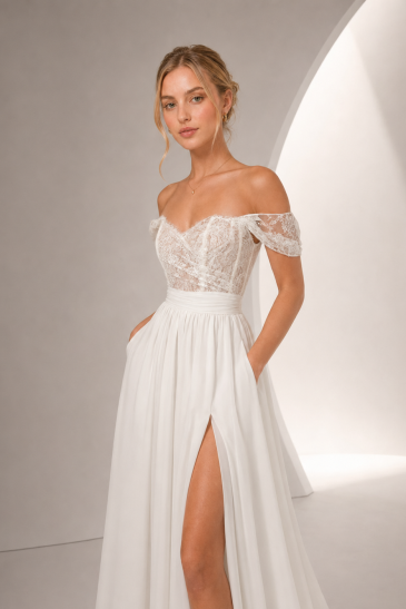 femme dans une robe de mariée bohème en dentelle