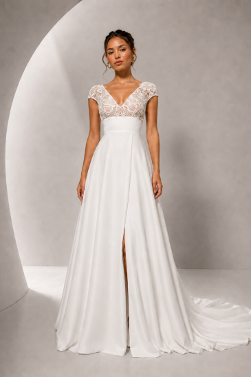 femme dans une robe de mariée A-line bohème en tulle brodé