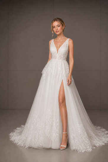 femme dans une robe de mariée princesse en tulle brodé à paillettes